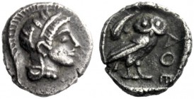  The J. FALM Collection: Miniature Masterpieces of Greek Coinage depicting Animals   Attica, Athens  Hemiobol circa 449-420, AR 0.34 g. Head of Athena...