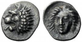  The J. FALM Collection: Miniature Masterpieces of Greek Coinage depicting Animals   Uncertain satraps  Tetartemorion circa 345-376, AR 0.24 g. Lion’s...