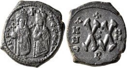 Phocas, 602-610. Dekanummium (Bronze, 21 mm, 5.94 g, 11 h), Constantinopolis, RY 4 = 605/6. O N FO NЄ PЄ AV Phocas, on the left, standing facing, hold...