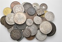 A lot containing 24 silver and 20 bronze coins. Includes: Islamic, early Medieval, and Modern. About very fine to extremely fine. LOT SOLD AS IS, NO R...