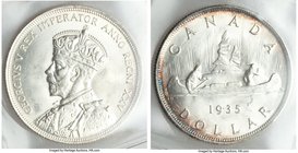 George V Dollar 1935 MS65 ICCS, Royal Canadian mint, KM30. Brilliant white obverse with peripheral toning on reverse. 

HID09801242017