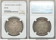 Nicholas I Rouble 1847-MW XF45 NGC, Warsaw mint, KM-C168.2. Golden brown toning with teal peripheries. 

HID09801242017