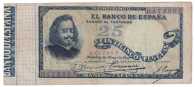 Banco de España
25 Pesetas. 17 mayo 1899. Serie B. Quevedo. ED.306a. Pequeña reparación. Escaso. MBC.