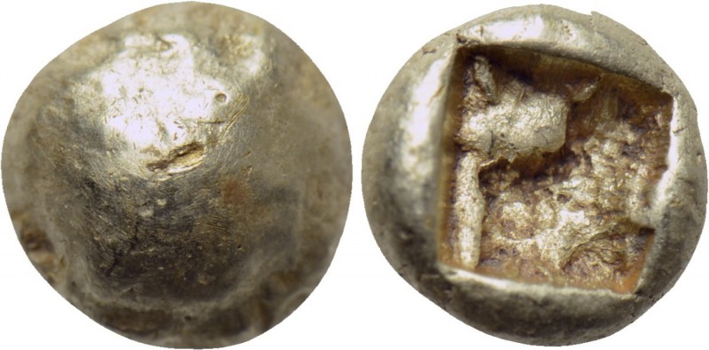 IONIA. Uncertain. EL 1/24 Stater (6th century BC). 

Obv: Plain globular surfa...