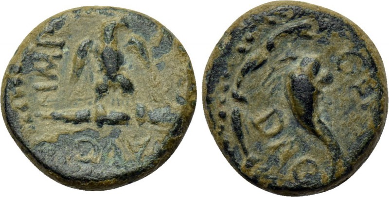 UNCERTAIN. Uncertain. Trajan (117-138). Ae. 

Obv: IMP TRA AVG. 
Eagle standi...