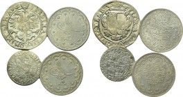 4 modern silver coins.