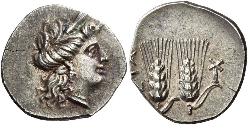 Metapontum
Quarter shekel circa 215-207, AR 1.98 g. Head of Demeter r. Rev. [ME...