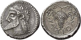 Naxos
Chalcidian drachm circa 500, AR 5.73 g. Ivy-wreathed head of Dionysus l., with pointed beard and hair in form of dots, falling in waves over ne...