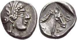 Pharsalus
Obol circa 450-430, AR 0.99 g. Head of Athena r., wearing earring and Attic helmet decorated with a snake. Rev. Φ – A – R Head of horse r. ...