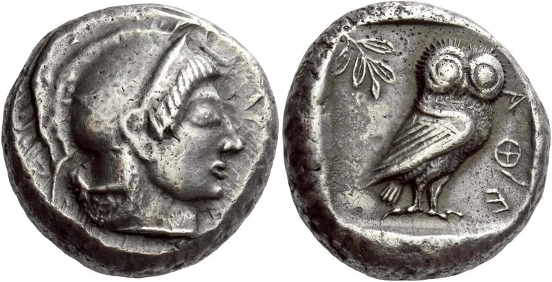 Attica, Athens
Tetradrachm 510-490, AR 17.19 g. Helmeted head of Athena r., wea...