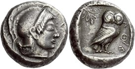 Attica, Athens
Tetradrachm 510-490, AR 17.19 g. Helmeted head of Athena r., wearing circular earring. Rev. AΘE Owl standing r., head facing; in l. fi...