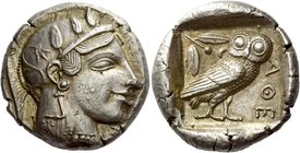 Attica, Athens
Tetradrachm circa 459-449, AR 17.19 g. Head of Athena r., wearing crested Attic helmet decorated with spiral palmette and three olive ...