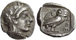 Attica, Athens
Obol circa 450-430, AR 0.68 g. Head of Athena r., wearing crested Attic helmet with three olive leaves over visor and spiral palmette ...