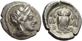 Attica, Athens
Hemidrachm circa 420-410, AR 2.03 g. Head of Athena r., wearing Attic helmet decorated with olive leaves and palmette. Rev. Α – Θ – Ε ...