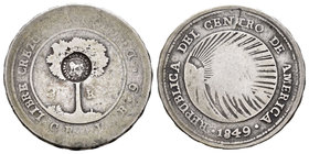 Costa Rica. (De Mey-475). Ag. 5,32 g. Resello de Costa Rica sobre un 2 reales de la República de Centro-América de 1849. BC+. Est...100,00.