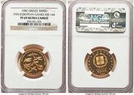 Republic gold Proof 5000 Drachmai 1982 PR69 Ultra Cameo NGC, KM144. Mintage: 50,000. Issued for the 13th Pan-European games. AGW 0.3617 oz. 

HID09801...