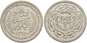 FRENCH PROTECTORATE 
 Reign of Muhammed al-Amin Bey (1362-1376ah / 1943-1957ce) 
 20 francs 1945ce/1365ah AR 20.08g Gad 108, KM M5 156 RR Fdc 
 Ex ...