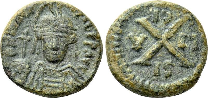 MAURICE TIBERIUS (582-602). Decanummium. Syracuse. 

Obv: Helmeted, draped and...