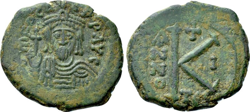 PHOCAS (602-610). Half Follis. Thessalonica. 

Obv: d m FOCA PPAVG. 
Crowned ...