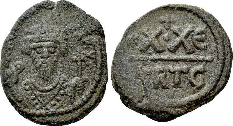 PHOCAS (602-610). Half Follis. Carthage. Dated RY 5. 

Obv: dN FOCAS PERP AVC....