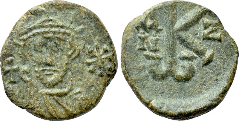 CONSTANS II (641-668). Follis. Syracuse. Dated IY 7. 

Obv: Crowned and draped...