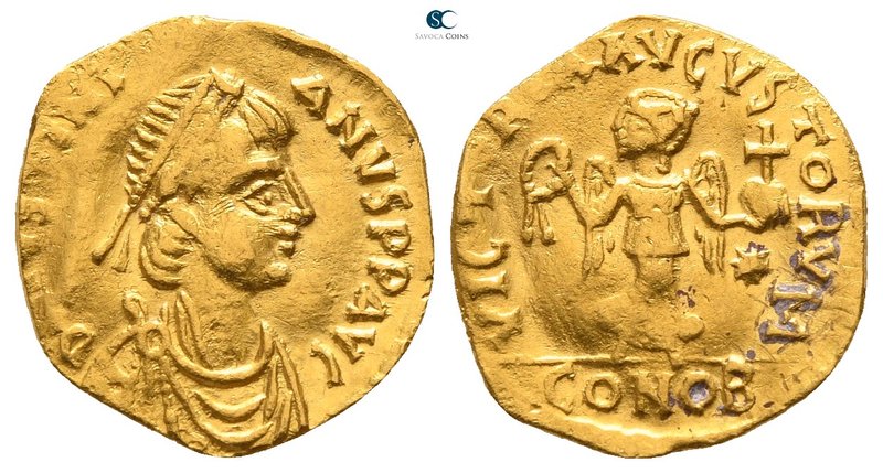 Justinian I AD 527-565. Constantinople
Tremissis AV

13mm., 1,10g.

D N IVS...