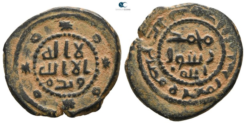 Ma'arrat Misrin AD 690-700. 
Fals Æ

20mm., 3,45g.

Islamic legend and date...