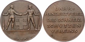 Schweiz Aarau
 Bronzemedaille 1924 Schützenmedaille, auf das 100-jährige Bestehen des Schützenvereins Aarau (1824-1924), von J.Schwyzer. 53,6g. 49,5 ...