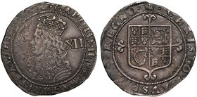 Charles II (1660-85), silver Shilling, third hammered issue (1661-62), crowned bust left, value XII in field behind, legend and toothed borders surrou...