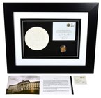 g Elizabeth II (1952-), gold Proof One Pound Coin, 2010, in presentation picture frame with plaster cast of the Belfast reverse designed by Stuart Dev...