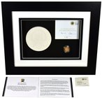 g Elizabeth II (1952-), gold Proof One Pound Coin, 2011, in presentation picture frame with plaster cast of the Edinburgh reverse designed by Stuart D...