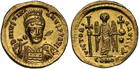 Byzantine Empire, Justinian I (A.D. 527-565), gold Solidus, mint of Constantinople, D N IVSTINIANVS PP AVG, pearl-diademed, helmeted and cuirassed bus...