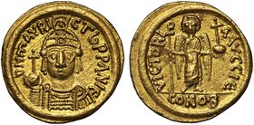 Byzantine Empire, Maurice Tiberius (A.D. 582-602), gold Solidus, mint of Carthage, D N MAVRIC Tb PP AN I E, draped and cuirassed bust facing, wearing ...