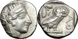 Continental Greece. Attica, Athens. AR Tetradrachm, 479-393 BC. D/ Head of Athena right, helmeted, with almost frontal eye. R/ Owl standing right, hea...