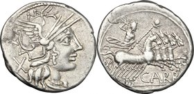 Cn. Papirius Carbo. AR Denarius, 121 BC. D/ Head of Roma right, helmeted. R/ Jupiter in quadriga right, holding reins and scepter and hurling thunderb...