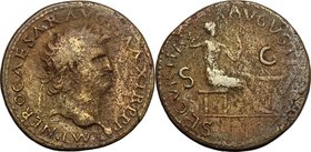 Nero (54-68). AE Dupondius, Lugdunum mint, 62-68. D/ Head right, laureate. R/ Securitas seated right, resting head against right hand and holding shor...