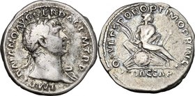 Trajan (98-117). AR Denarius, 103-111. D/ Bust right, laureate, draped on left shoulder. R/ Nude captive seated right on pile of shields and arms. RIC...