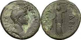 Trajan (98-117). AE 25mm, Caria, Tabae, 98-117. D/ Bust right, laureate, draped on left shoulder. R/ Goddess standing facing, wearing kalathos on head...