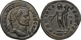 Maximinus II Daia (308-313). AE Follis, Antioch mint, 308 AD. D/ Head right, laureate. R/ Genius standing left, wearing modius on head and chlamys ove...