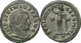 Licinius I (308-324). AE 21mm, Ticinum mint, 313-314. D/ Head right, laureate. R/ Sol standing left, wearing chlamys over left shoulder, raising right...