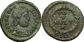 Theodosius I (379-395). AE 15mm, Siscia mint, 378-383. D/ Bust right, diademed, draped, cuirassed. R/ VOT/V/MVLT/X within wreath. RIC 29D. AE. g. 1.41...