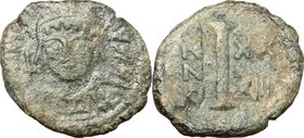 Justinian I (527-565). AE 10 Nummi, Theupolis (Antioch) mint, 560-561. D/ Bust of Justinian facing, helmeted. R/ Mark of value (I). MIB 159. DOC 262-2...