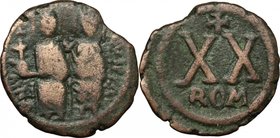 Justin II (565-578). AE 20 Nummi, Rome mint, 565-578. D/ Justin and his wife Sophia enthroned facing. R/ XX (mark of value). MIB 95a (military mint). ...