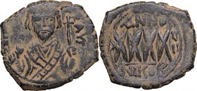 Phocas (602-610). AE Follis, Nicomedia mint, 605-606. D/ Consular bust facing, holding mappa and cross. R/ Large XXXX (mark of value). MIB 69. AE. g. ...