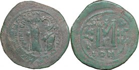 Heraclius (610-641). AE Follis, Constantinople mint, 613-614. D/ Emperor and his son standing facing, crowned, both holding globus cruciger. R/ Large ...