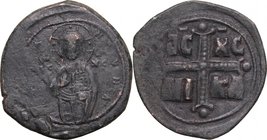 Michael IV (1031-1041). AE Follis, Constantinople mint, 1031-1041. D/ Three-quarter length figure of Christ facing, cross-nimbed, raising right hand f...