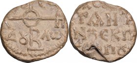PB Seal, c. 10th century. D/ Cruciform invocative monogram. R/ Inscription. PB. g. 11.24 mm. 20.00 VF.