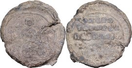 PB Seal, Constantinople, 14th century. D/ The Virgin Mary enthronrd facing, holding the infant Christ on her lap. R/ Inscription in five lines. PB. g....