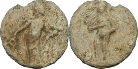 PB Tessera. D/ Figure standing left, holding caduceus downwards and cornucopiae. R/ Figure standing facing, holding large round thing with both hands ...