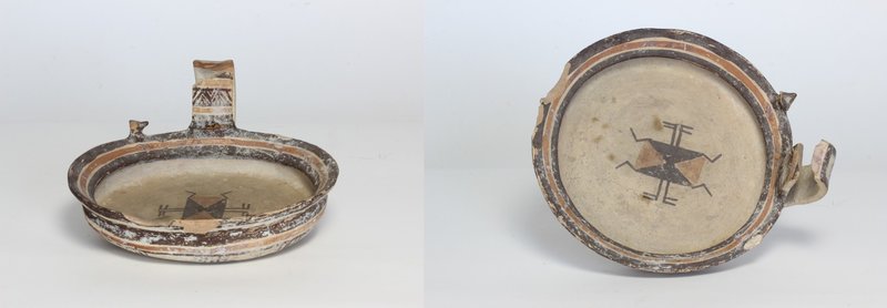 Greek Daunian Kyathos.
 Rounded bowl with single strap handle, decorated with r...